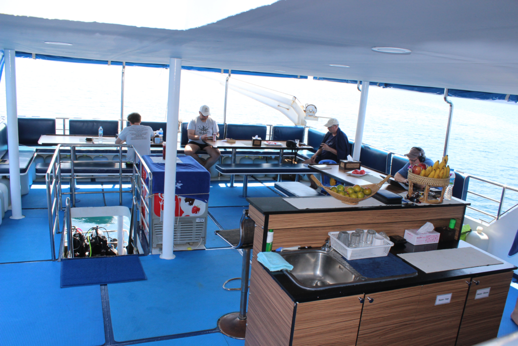 Outdoor dining deck on Bavaria liveaboard dive boat