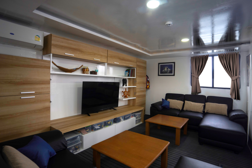 Indoor saloon area on Bavaria liveaboard dive boat
